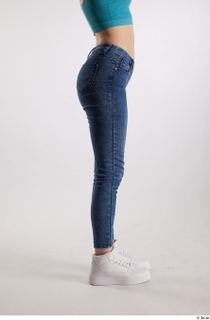 Rada  1 blue jeans casual dressed flexing leg side…